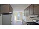 Kitchen featuring abundant cabinet space and stainless steel refrigerator at 508 Jaywood Dr, Stone Mountain, GA 30083