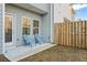 Inviting outdoor patio with chairs, fenced-in yard, and easy backyard access at 6089 Mallory Rdg, Union City, GA 30291