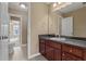 Bathroom with a sink, toilet and views into another room at 8885 Camp Tree Ct, Winston, GA 30187