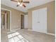 Bedroom featuring neutral walls, carpeted flooring, and a large closet at 8885 Camp Tree Ct, Winston, GA 30187