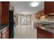 Bright kitchen area with a large window, stainless steel appliances and tile flooring at 8885 Camp Tree Ct, Winston, GA 30187