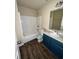 Bathroom with bathtub, toilet and a single vanity sink at 256 Oakview Dr, Canton, GA 30114