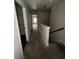 Hallway with carpet and neutral walls leading to the upper floors at 256 Oakview Dr, Canton, GA 30114