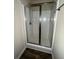 Bathroom shower with glass door and chrome fixtures at 256 Oakview Dr, Canton, GA 30114