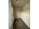 Empty walk-in closet providing shelf space, rod for clothing, and carpet flooring at 256 Oakview Dr, Canton, GA 30114