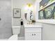 Bathroom featuring new fixtures and updated marble tile shower at 3187 Clifton Church Rd, Atlanta, GA 30316