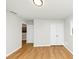 Bright bedroom featuring fresh paint, hardwood floors, ample closet space, and a neutral color palette at 3187 Clifton Church Rd, Atlanta, GA 30316