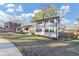 Charming two-story home with a manicured lawn and inviting entryway, painted white with black shutters at 3187 Clifton Church Rd, Atlanta, GA 30316