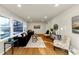 Bright living room with hardwood floors, large window and stylish furniture with great natural light at 3187 Clifton Church Rd, Atlanta, GA 30316
