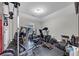 Home gym with a variety of workout equipment and rubber flooring at 557 Clinton Dr, Temple, GA 30179