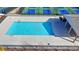 Overhead view of a sparkling blue community pool with clean surroundings and ample space for relaxation at 2212 Whistler Ne Way, Lawrenceville, GA 30043