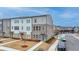 View of the townhome community, showcasing landscaping and architectural details at 2212 Whistler Ne Way, Lawrenceville, GA 30043