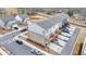 Aerial view of townhomes with private decks, garages, and well-maintained landscaping in a modern community at 2212 Whistler Ne Way, Lawrenceville, GA 30043
