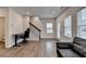 Bright living space features wood floors, staircase and natural light from windows with great view at 2212 Whistler Ne Way, Lawrenceville, GA 30043