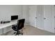 Bright office space featuring a desk, modern computer, and neutral-toned walls and carpet at 2212 Whistler Ne Way, Lawrenceville, GA 30043