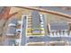 Aerial view of a modern gray townhouse with well-maintained landscaping in a friendly neighborhood at 2212 Whistler Ne Way, Lawrenceville, GA 30043
