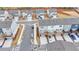 Aerial view of townhouses with balconies, driveways, and neat landscaping in a well-planned community at 2212 Whistler Ne Way, Lawrenceville, GA 30043