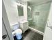 Bathroom featuring stylish shower, vanity and black tile floor at 2495 Se Glendale Se Cir, Smyrna, GA 30080