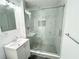 Bathroom featuring stylish shower with glass doors, vanity and tile floor at 2495 Se Glendale Se Cir, Smyrna, GA 30080