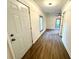 Hallway featuring wood look flooring and view into another room at 2495 Se Glendale Se Cir, Smyrna, GA 30080