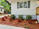Well-maintained flower beds with colorful azaleas and fresh mulch at 2495 Se Glendale Se Cir, Smyrna, GA 30080