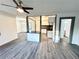 Open concept living room featuring modern ceiling fan and view to kitchen at 2495 Se Glendale Se Cir, Smyrna, GA 30080