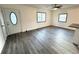 Spacious living room featuring wood flooring and a stylish front door at 2495 Se Glendale Se Cir, Smyrna, GA 30080