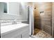Beautiful bathroom with tiled shower and pebble floor at 4230 Deerwood Se Pkwy, Smyrna, GA 30082