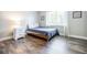 Bright bedroom with a large window and hardwood flooring at 4230 Deerwood Se Pkwy, Smyrna, GA 30082
