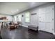 Spacious living room area with new floors and lots of light from the windows at 4230 Deerwood Se Pkwy, Smyrna, GA 30082