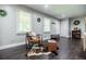 Cozy living room featuring dark hardwood floors and natural light at 4230 Deerwood Se Pkwy, Smyrna, GA 30082