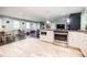 Bright, open floorplan with hardwood floors connects kitchen to living area at 4230 Deerwood Se Pkwy, Smyrna, GA 30082