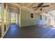 Relaxing screened porch with outdoor views, providing a serene retreat at 4230 Deerwood Se Pkwy, Smyrna, GA 30082