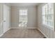 Neutral bedroom featuring carpeted floors, light gray walls, and window with natural light at 1340 Bernard Nw St, Atlanta, GA 30314