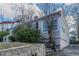 Exterior view of home showcasing a low-maintenance landscape and a side entrance at 1340 Bernard Nw St, Atlanta, GA 30314