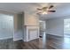Cozy living room featuring wood floors, a fireplace, and neutral paint colors at 1340 Bernard Nw St, Atlanta, GA 30314