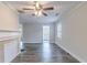 Living room area featuring a fireplace, wood style floors and neutral paint colors at 1340 Bernard Nw St, Atlanta, GA 30314