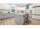 Spacious kitchen with a center island, stainless steel appliances, and stylish cabinetry at 921 Cone Rd, Forest Park, GA 30297