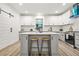 Updated kitchen featuring an island, stainless appliances, and stylish accents at 921 Cone Rd, Forest Park, GA 30297