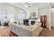 Bright living room featuring wood floors, fireplace, and a large sectional sofa at 193 Idylwilde Way, Canton, GA 30115