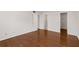 Spacious bedroom with hardwood floors and access to a walk-in closet at 2116 N Forest Trl, Dunwoody, GA 30338