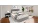 Serene bedroom with neutral tones, soft rug, and a large window for natural light at 2116 N Forest Trl, Dunwoody, GA 30338