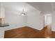 Open dining room with hardwood floors, ample lighting, and easy access to other areas at 2116 N Forest Trl, Dunwoody, GA 30338