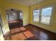 Dining room showcasing hardwood floors and ample natural light at 3706 College Ave, Clarkston, GA 30021