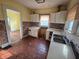 Retro kitchen with classic cabinetry and tiled backsplash at 3706 College Ave, Clarkston, GA 30021