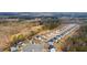 Picturesque aerial view of a residential community nestled amidst a scenic landscape at 310 Indian Lake Trl, Villa Rica, GA 30180