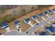 Aerial view of a residential neighborhood showcasing well-maintained homes and neatly landscaped yards at 310 Indian Lake Trl, Villa Rica, GA 30180
