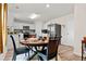 Eat-in kitchen with stainless steel appliances, breakfast table, and updated modern cabinets for a contemporary feel at 310 Indian Lake Trl, Villa Rica, GA 30180