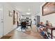 Eat-in kitchen featuring stainless steel appliances, including a refrigerator, and a breakfast table with seating at 310 Indian Lake Trl, Villa Rica, GA 30180