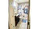 Well-lit bathroom with decorative shower curtain and wooden vanity at 4567 Duncan Dr, Sugar Hill, GA 30518